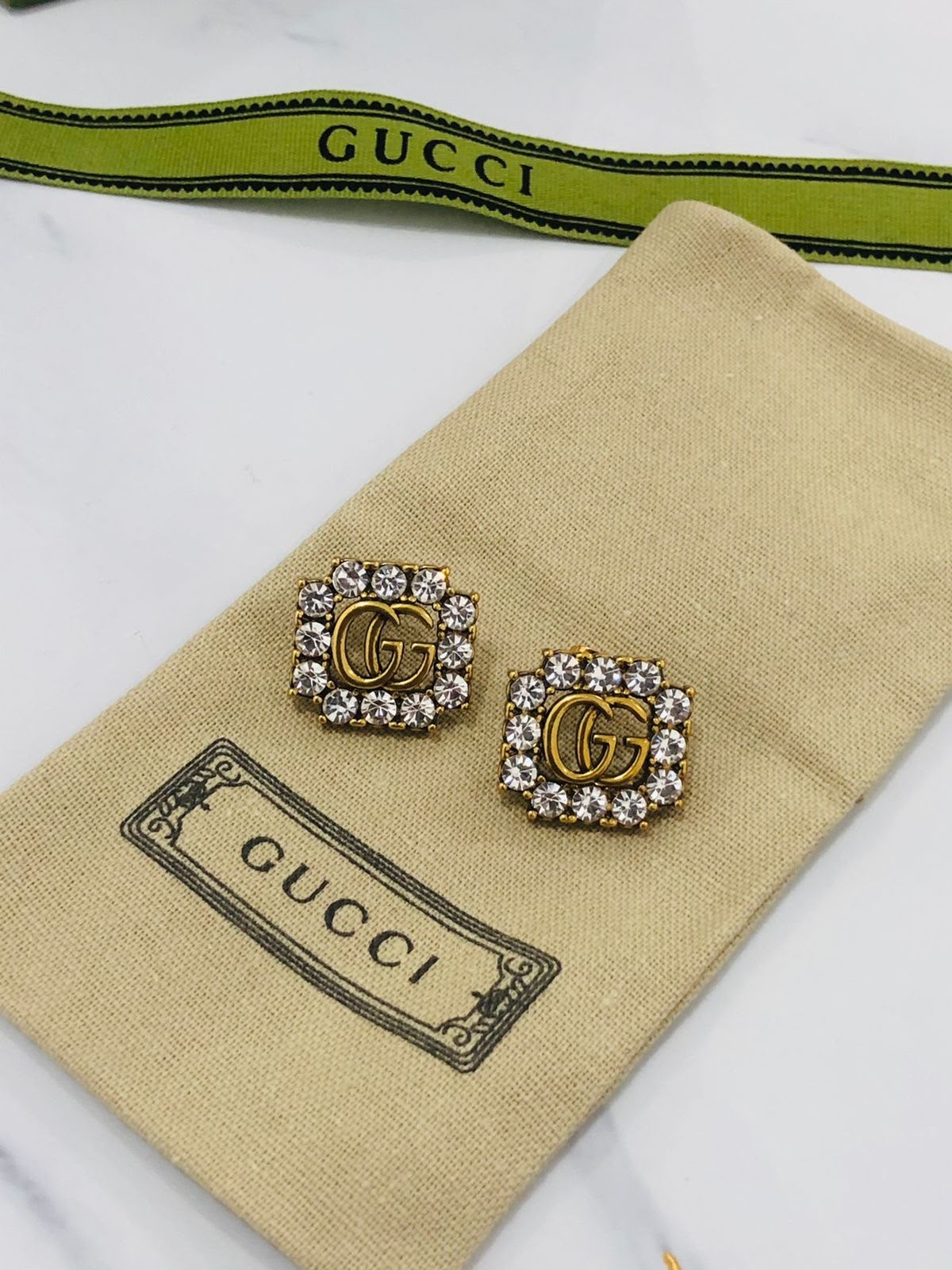 Gu. earrings