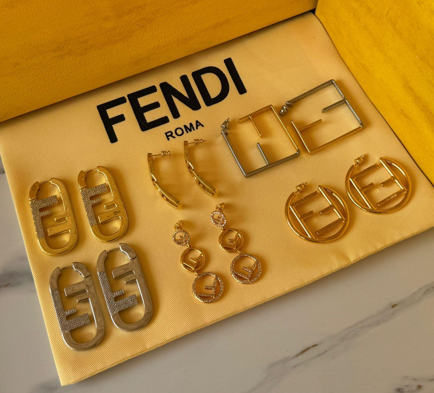 Fe. Earring