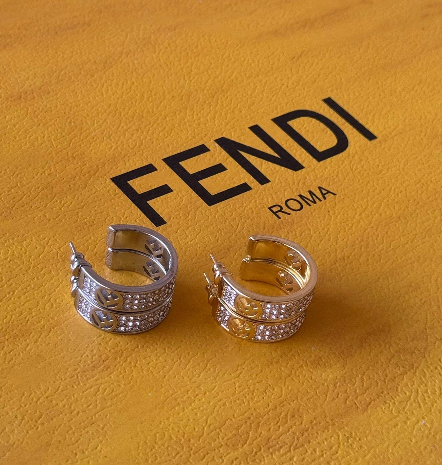 Fe. Earring