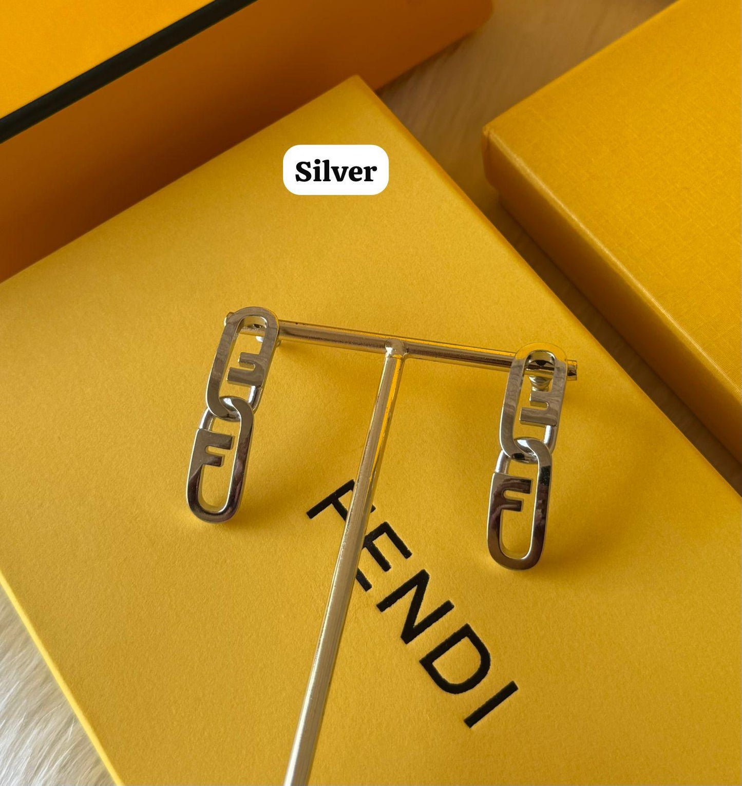 Fe. Earring