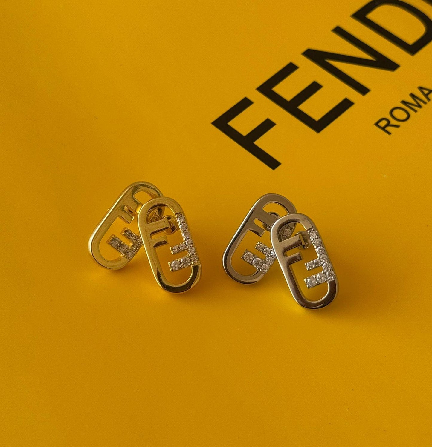 Fe. Earring