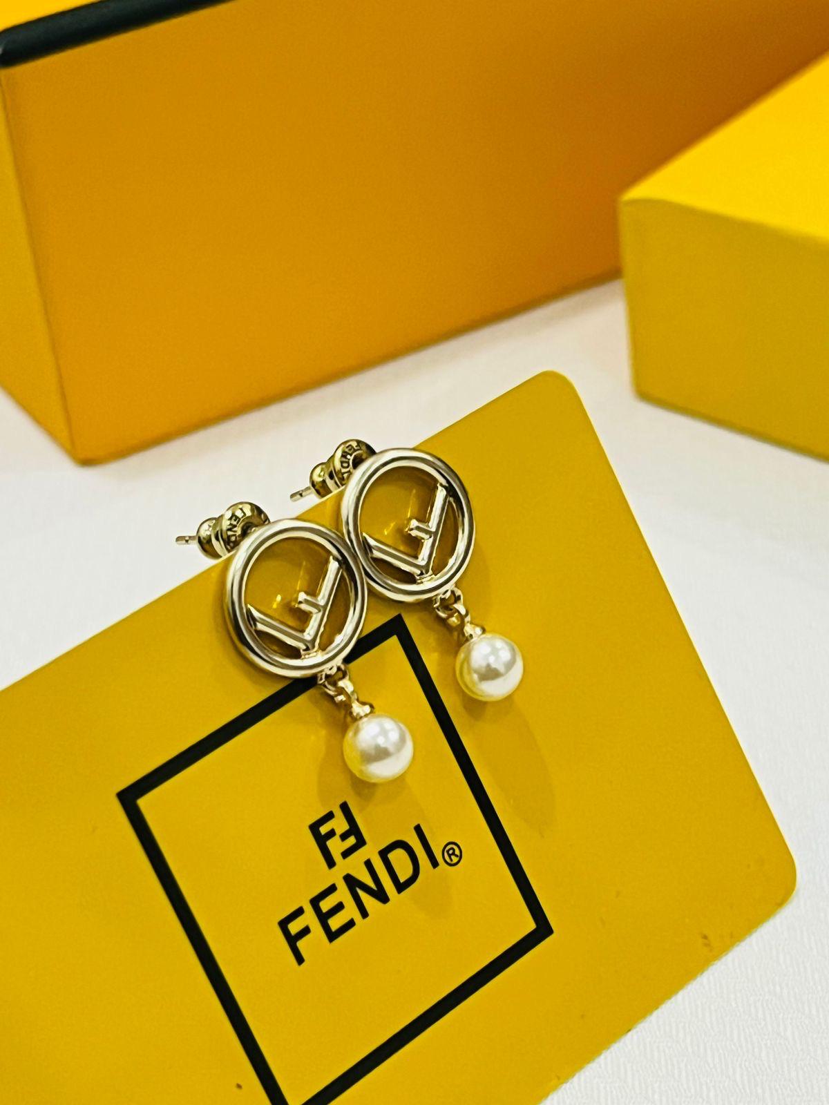 Fe. Earring