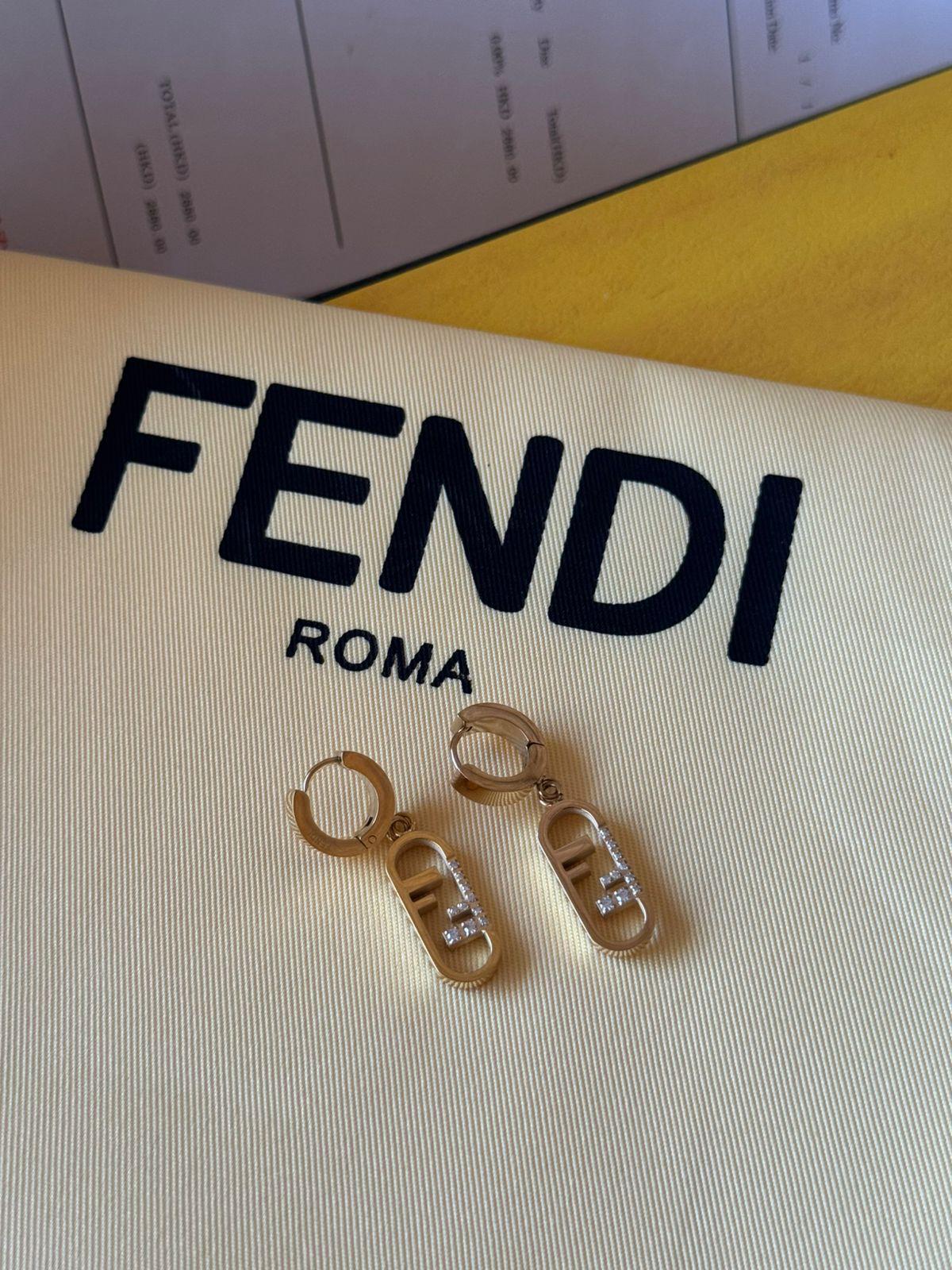 Fe. Earring