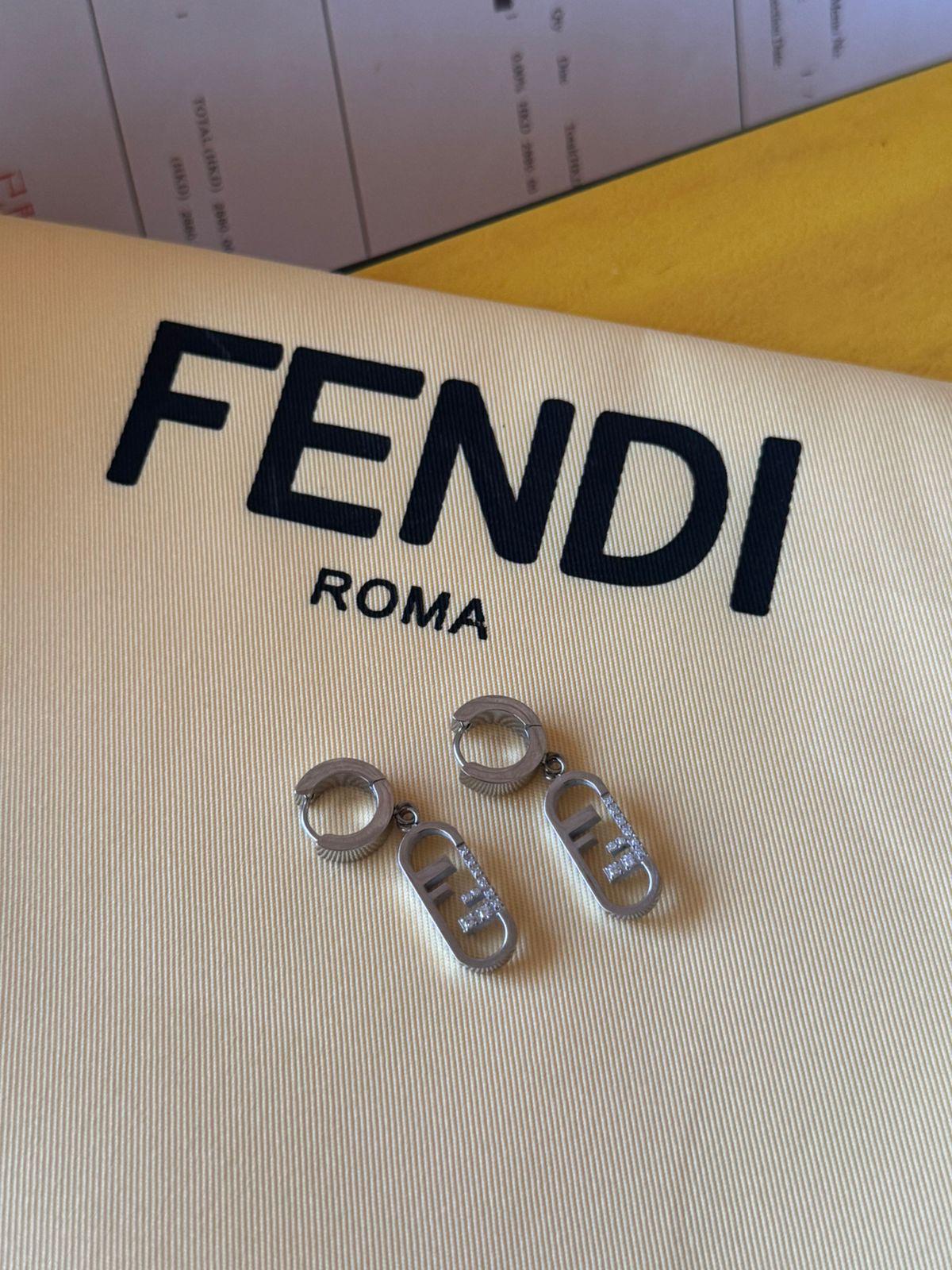Fe. Earring
