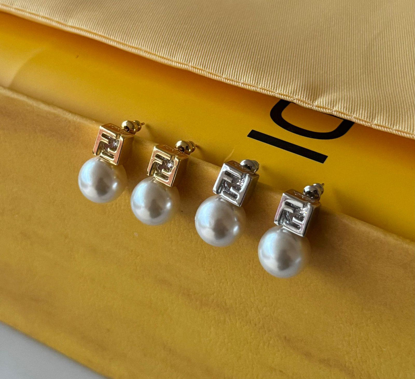 Fe. Earring