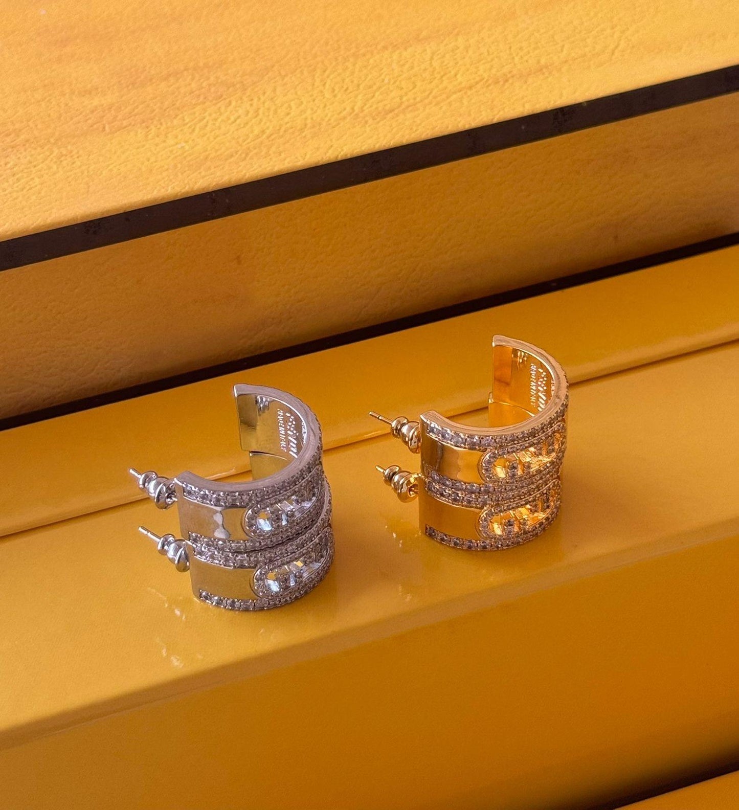 Fe. Earring