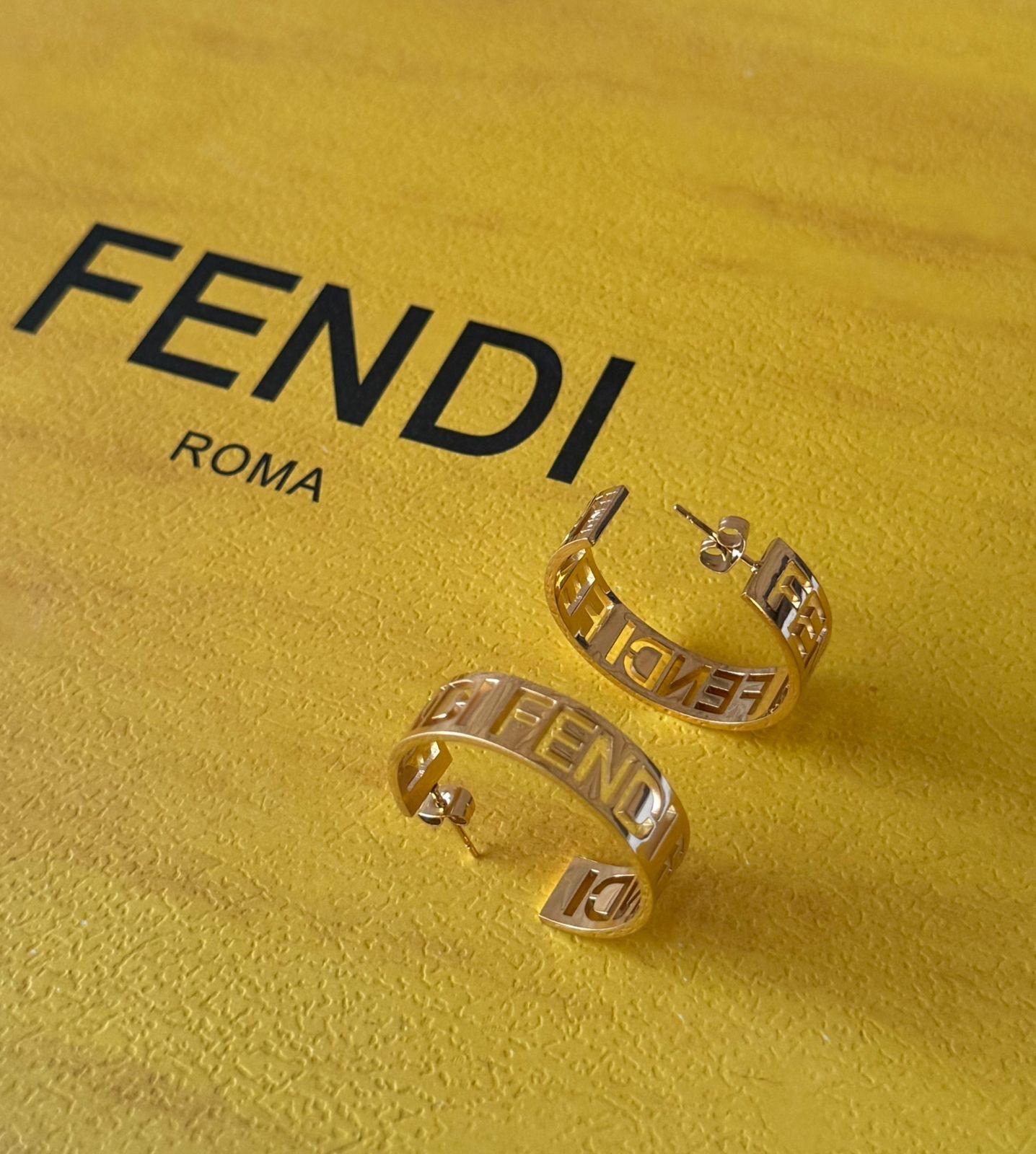 Fe. Earring