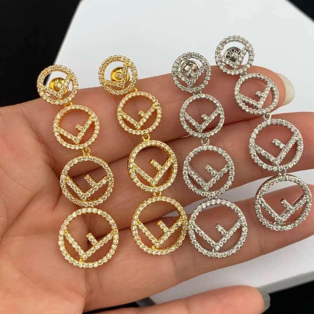 Fe. Earring