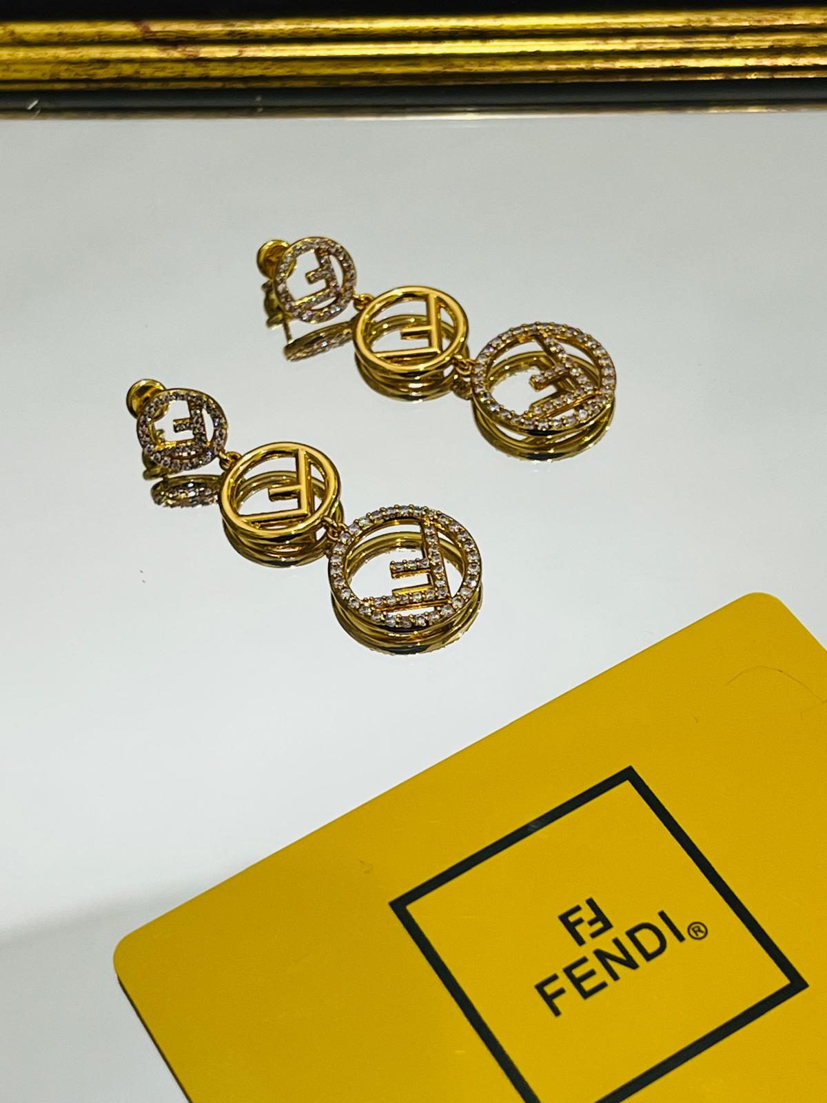 Fe. Earring